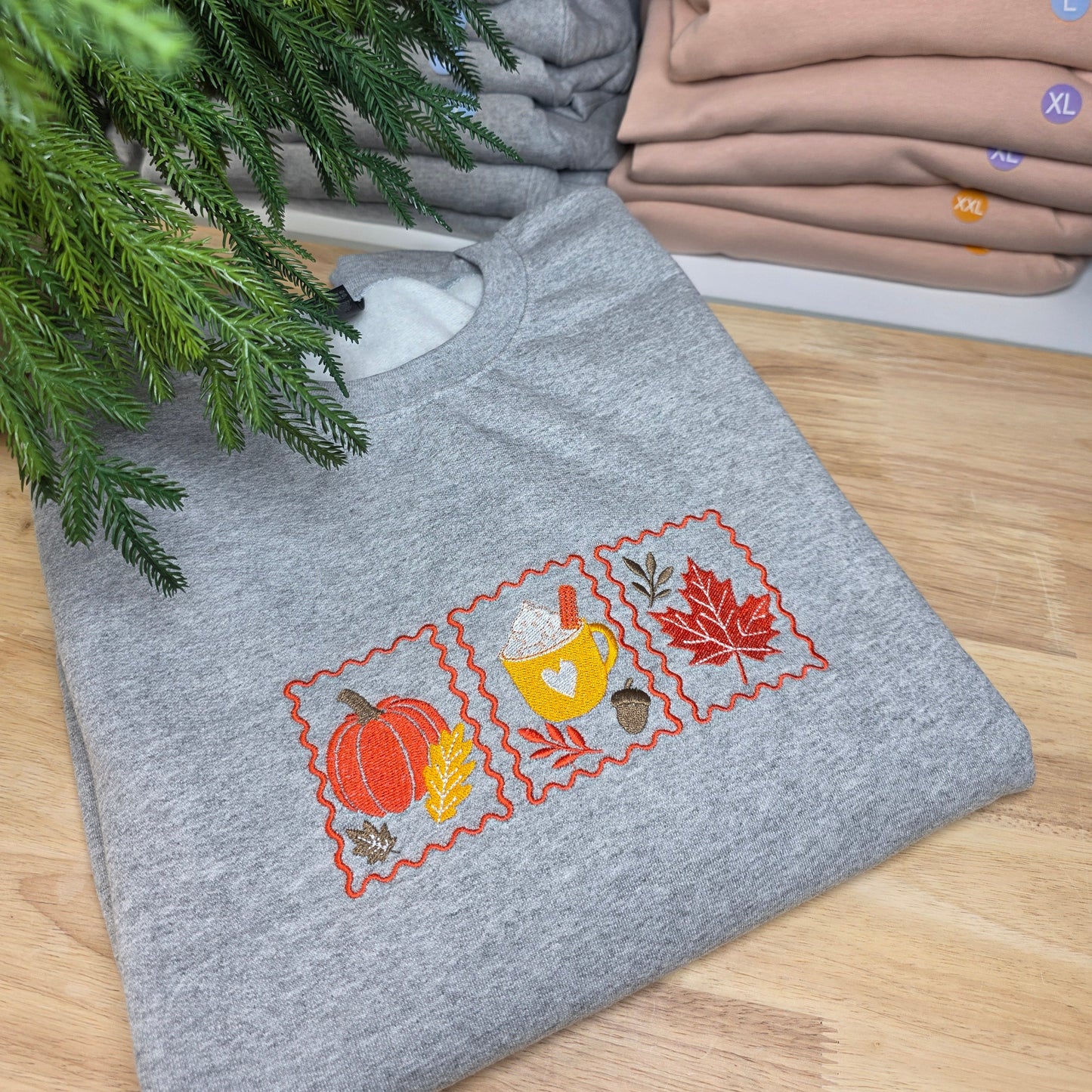 Embroidered Cozy Fall Stamps Sweatshirt