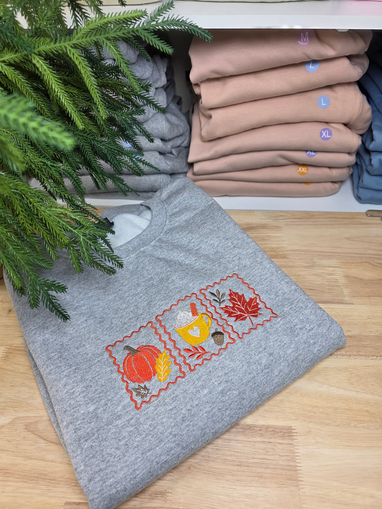 Embroidered Cozy Fall Stamps Sweatshirt