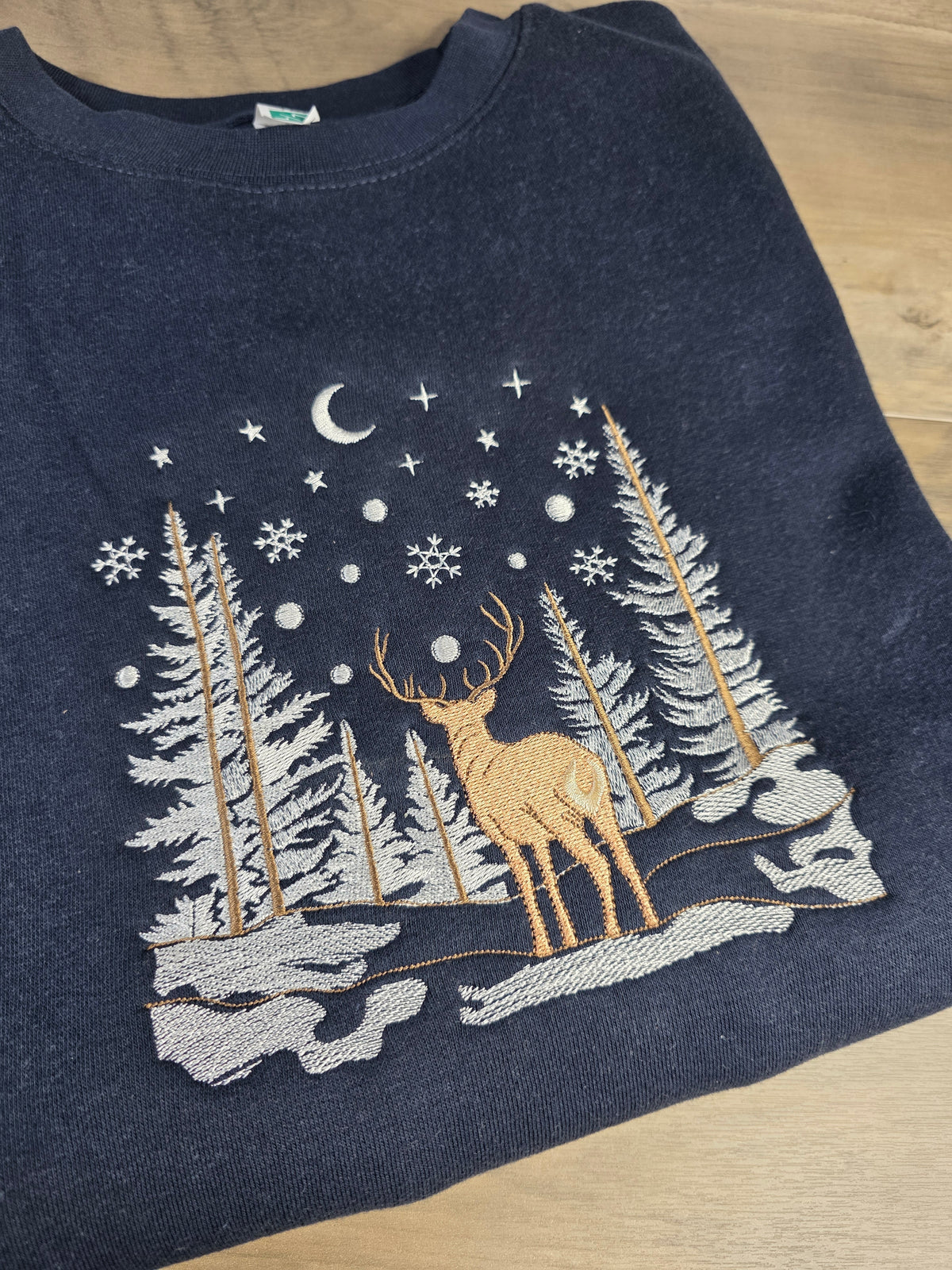 Embroidered Winter Forest Magic Premium Sweatshirt (Lane Seven)