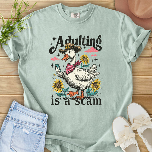 Adulting Is A Scam Tee