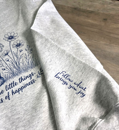 Whispers of Happiness Sweatshirt with Sleeve Message