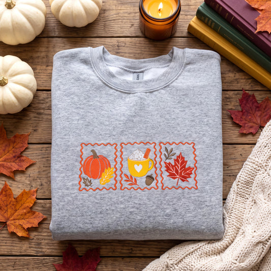 Embroidered Cozy Fall Stamps Sweatshirt